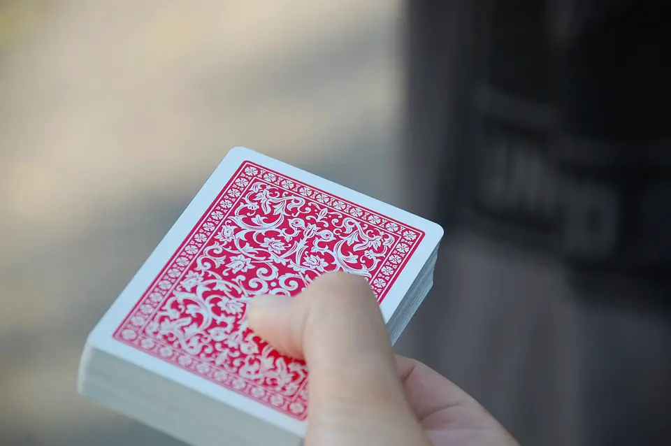 cards being held by hand
