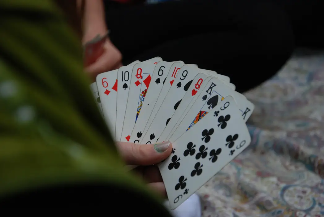 cards held by hand